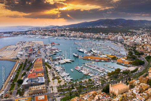 Foto Aerial view of San Antoni de Portmany harbor at sunset