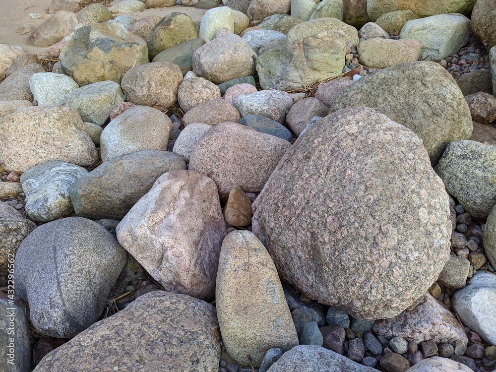 many different stones of different sizes during the daytime many different stones of different sizes during the daytime