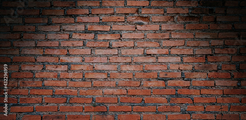 Old red brick wall with shadow texture can be use as background 