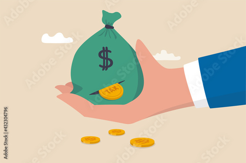 Tax payment or losing money without tax planning concept, businessman hand holding big money bag of revenue been slitted with dollar coin loss with the word tax.