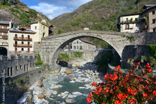 Pont Saint Martin, Aosta Valley, Italy. -10-11-2020- The ancient Roman bridge over the Lys river. photo