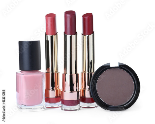 Different luxury cosmetic products on white background