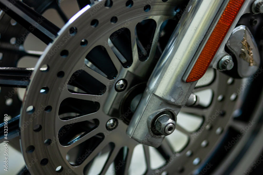 steel disc from motorcycle wheel close-up. steel disc from motorcycle wheel close-up.