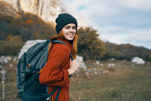 woman hiker walking in nature rocks travel vacation