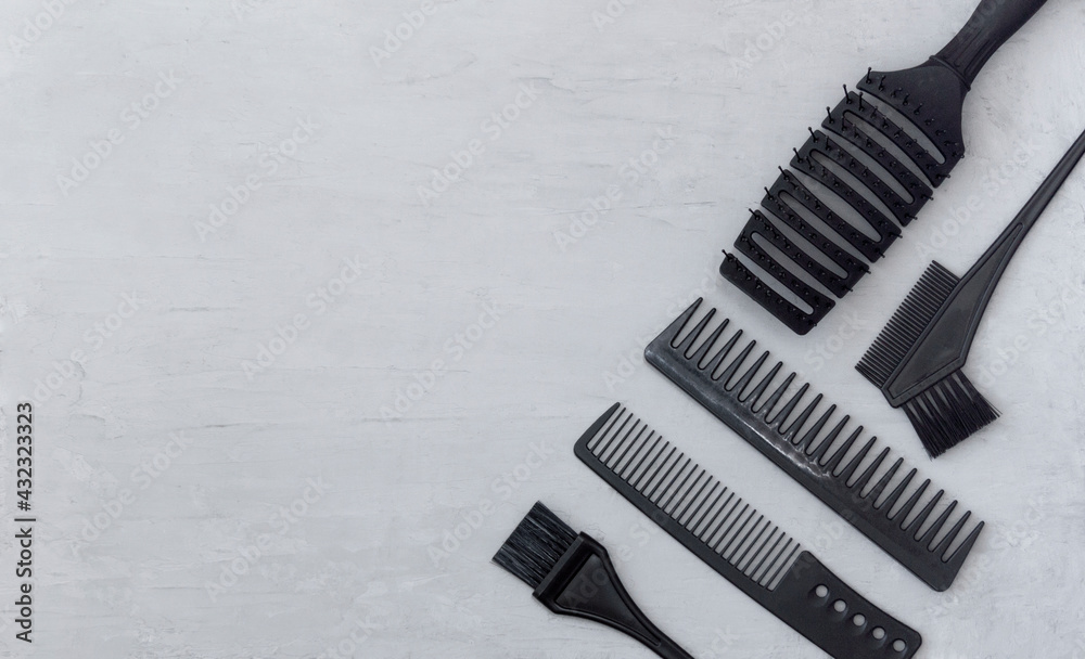 Background, frame with hairdressing tools on gray. Template for information Background, frame with hairdressing tools on gray. Template for information