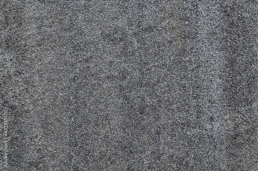gray-black background with tiny bright pebbles gray-black background with tiny bright pebbles