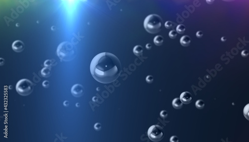 Abstract background. Chrome spheres of different sizes on a dark background