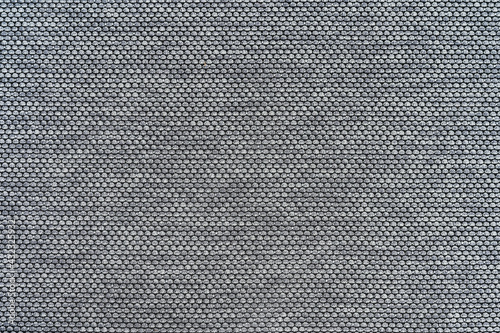 repeating pattern on gray fabric