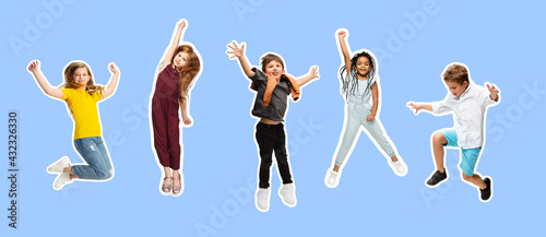 Group of elementary school kids or pupils jumping in colorful casual clothes on blue background. Collage.