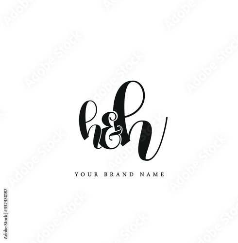 'H and H' company initial letters logo on white background. 'H and H' letters monogram.
