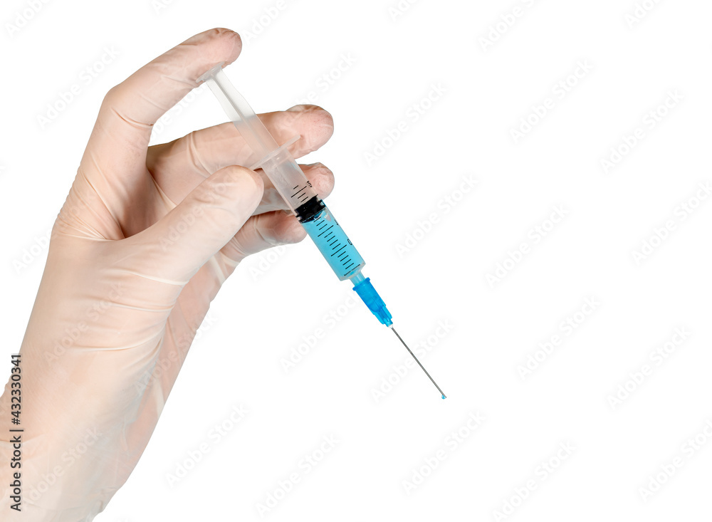 women's hands in white rubber medical gloves hold a syringe with medicine on a white background women's hands in white rubber medical gloves hold a syringe with medicine on a white background