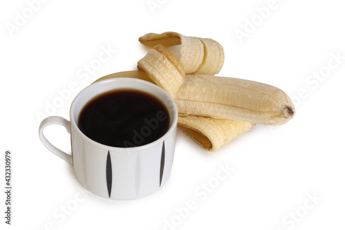 Ripe yellow banana and cup of coffee on white background. Ingredients for cooking