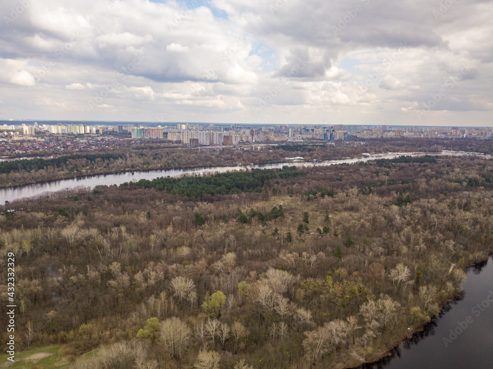 Fototapeta premium Dnieper river in Kiev in the afternoon. Aerial drone view.
