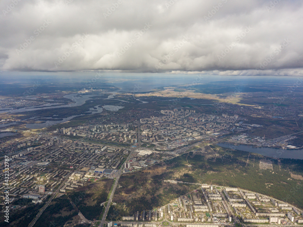 The city of Kiev in cloudy weather. Aerial high view. The city of Kiev in cloudy weather. Aerial high view.