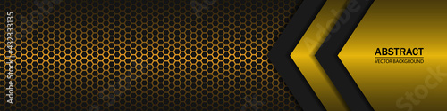 Black and yellow arrow shapes on a gold hexagonal carbon fiber texture. Geometric shapes on a hexagonal gold grid.
