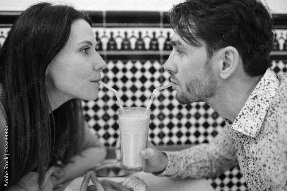 Couple trying horchata in cafe of Valencia Couple trying horchata in cafe of Valencia