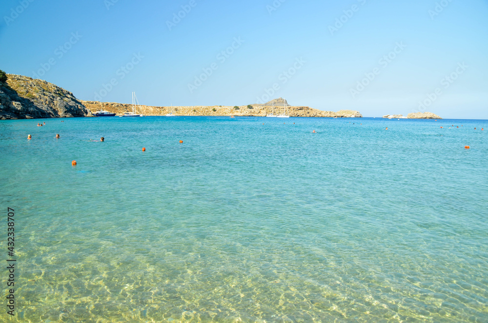 sea beach in lindos in rhodes island in greece