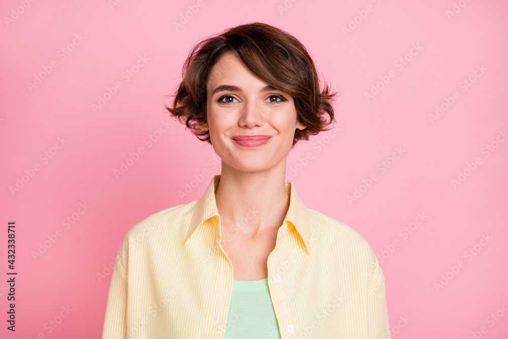Photo of cute sweet funny young lady dressed yellow shirt smiling isolated pink color background