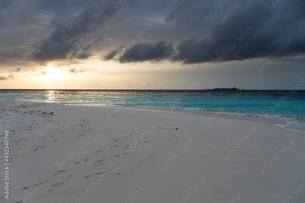 Summer vacations on the beaches of the maldives in the middle of the indian ocean