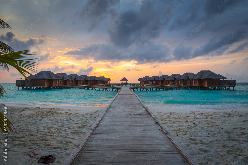 sunset on the beaches of maldives