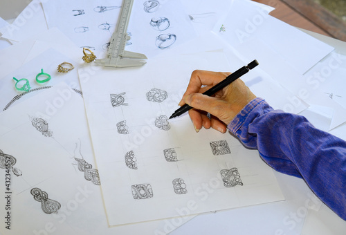 The sketch is designing jewelry rings.