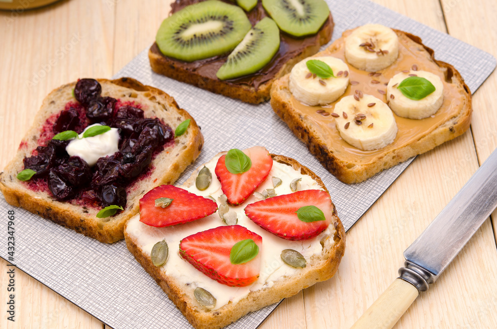 sweet vegetarian toasts with different fillings on the table