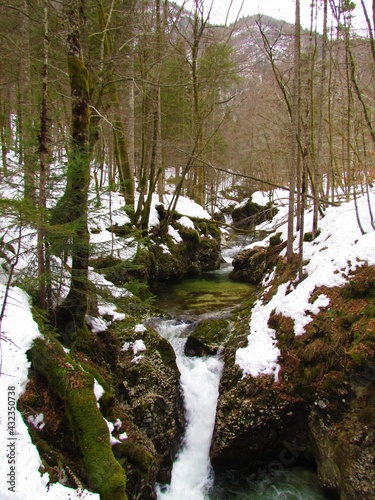 Waterfall at Mostnica creek at Mostnica Gorge in Gorenjska, Slovenia in winter
