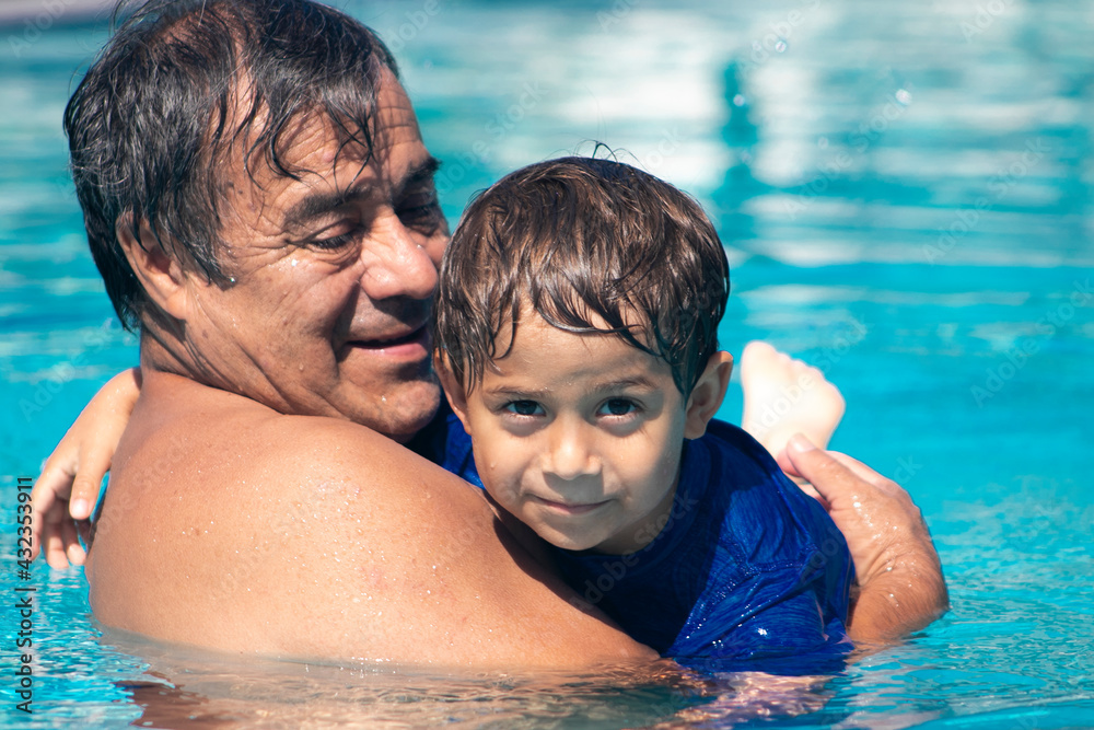 Summer with family in the pool Summer with family in the pool