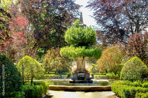 Fountain in Botanical garden of the University of Coimbra in the spring. 