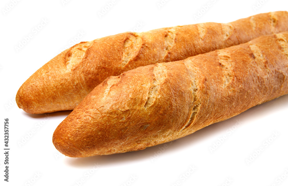 Two baguettes on a white background. French baguette.