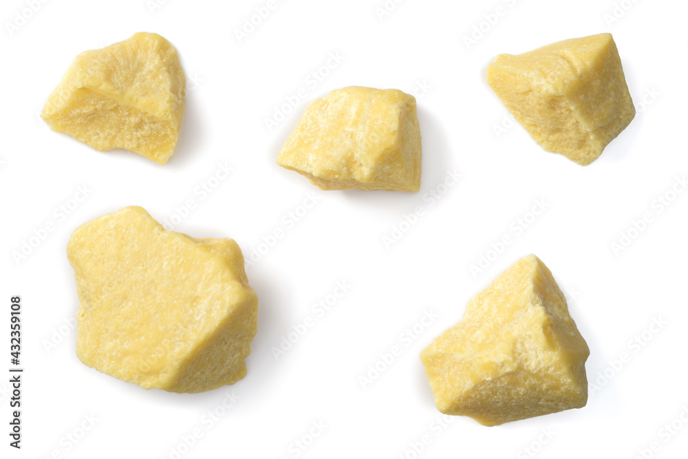 raw cocoa butter isolated on white background, top view raw cocoa butter isolated on white background, top view