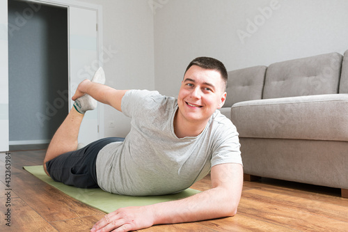 Man doing exercises at home