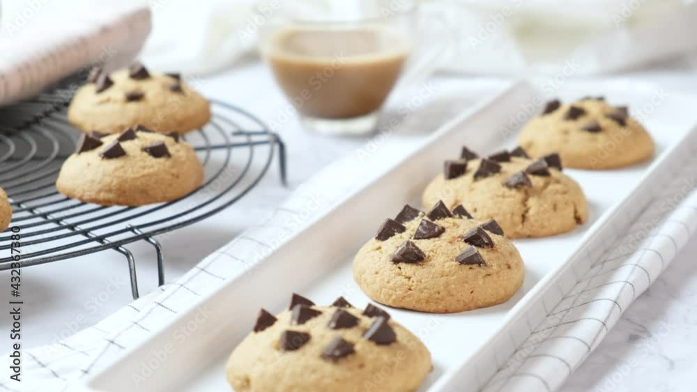Delicious Whole Wheat Chocolate Chip Cookies set on white cafe table. Delicious Whole Wheat Chocolate Chip Cookies set on white cafe table.