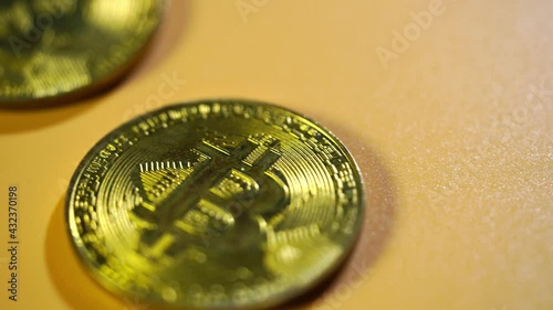 close up of bitcoin on wood table top