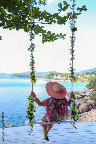 Elderly Asian women enjoying their sea beat tourism after the coronavirus epidemic resolves.