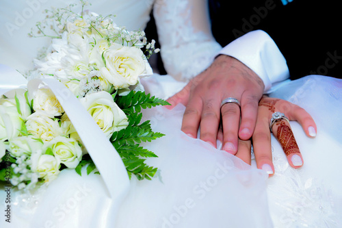 A moroccan wedding couple hands... photo