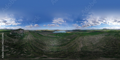 360 degree aerial photo of Ogliastro lake in the heart of Sicily with Etna view. Place of great naturalistic value surrounded by hills planted with cereals. A destination for migratory bird species. photo