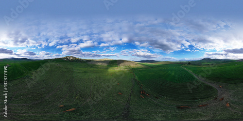360 degree aerial photo of Ogliastro lake in the heart of Sicily with Etna view. Place of great naturalistic value surrounded by hills planted with cereals. A destination for migratory bird species.