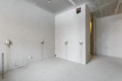 interior of the apartment without decoration in gray colors