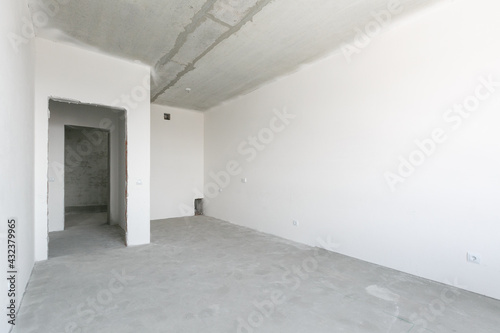 interior of the apartment without decoration in gray colors