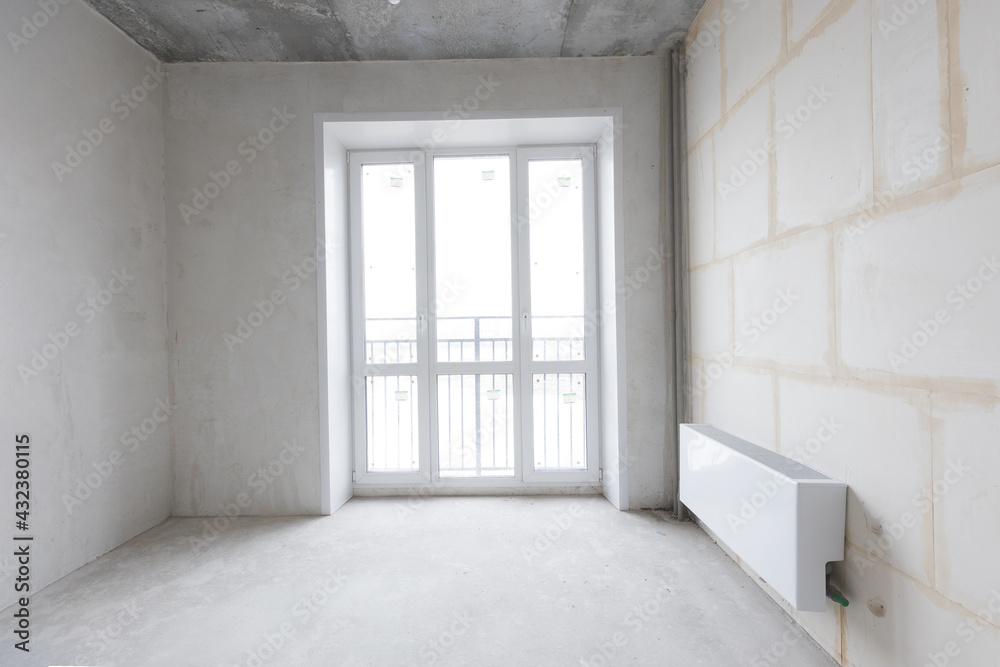 Fototapeta premium interior of the apartment without decoration in gray colors