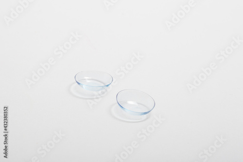 Contact lenses without container on a white background