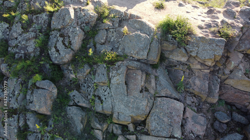 Sheer stone rock, aerial view. Boulders from a bird's eye view.