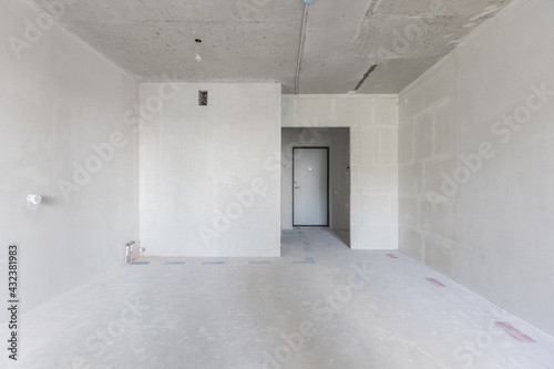 interior of the apartment without decoration in gray colors