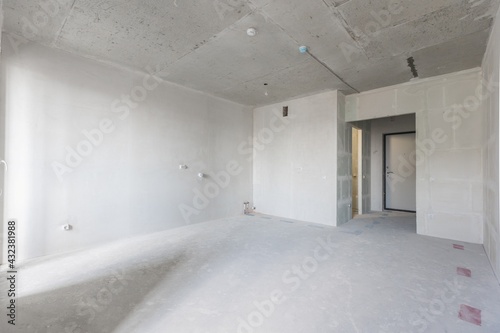 interior of the apartment without decoration in gray colors