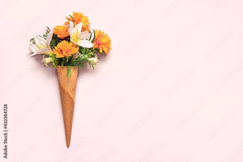 ice cream cone with flowers with copy space