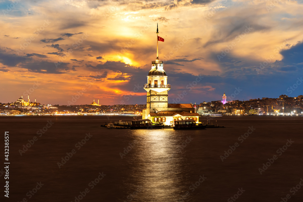 Illuminated Maiden's Tower at night in the Bosphorus, Istanbul