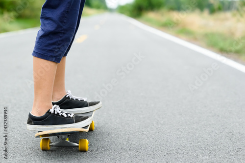 Child Play Skateboard on the Countryside Road