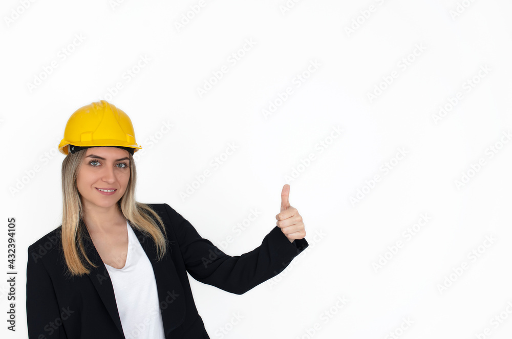 Portrait woman engineer with yellow safety helmet isolated on white background Portrait woman engineer with yellow safety helmet isolated on white background