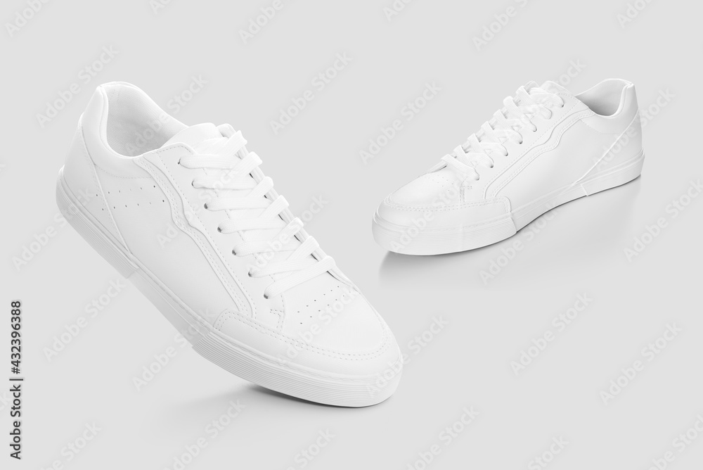Mockup of a pair of sneakers isolated against plain background